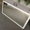 Photo of MIRROR ON 40MM THICK WHITE BOARD WITH FIXINGS