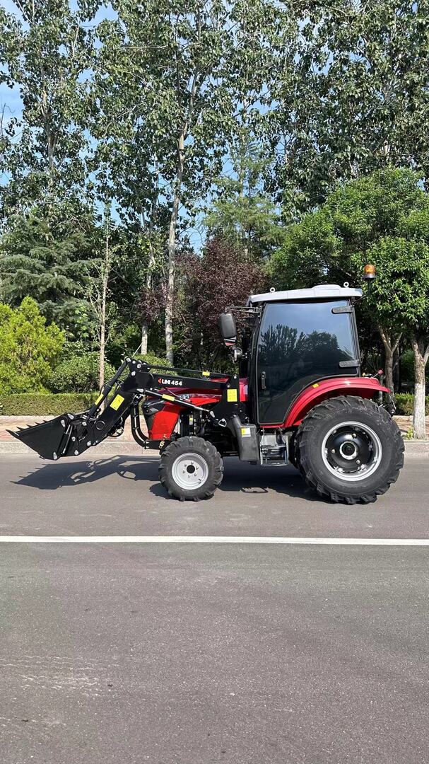 Photo of NEW UHI T454C 45HP CAB TRACTOR WITH 7 ATTACHMENTS